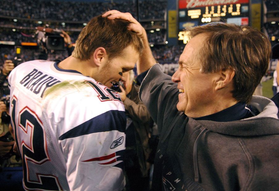 Brady and Patriots coach Bill Belichick celebrate after a playoff win in January 2007. The two were together for Brady's entire Patriots career.