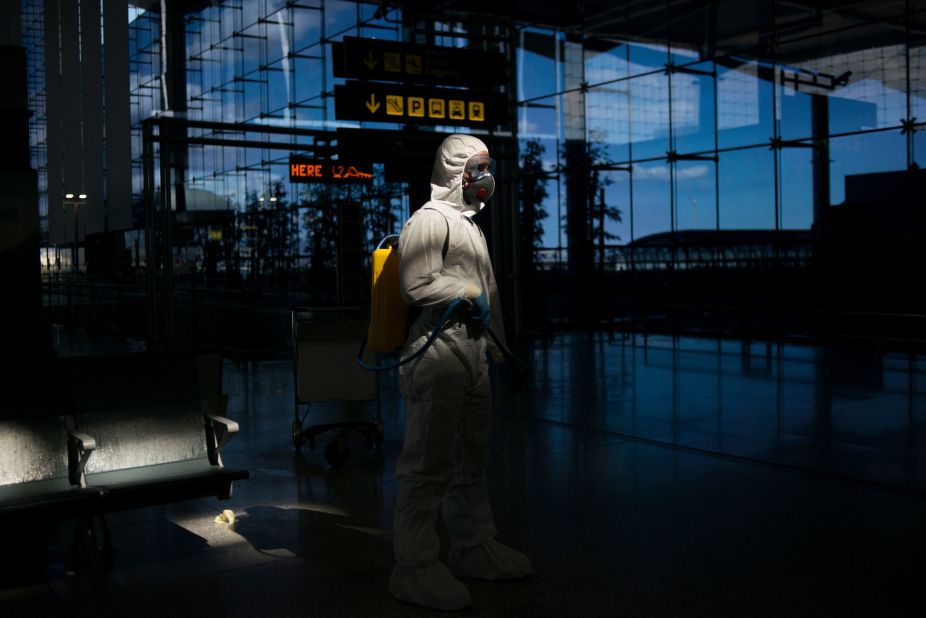 A member of Spain's Military Emergencies Unit carries out a general disinfection at the Malaga airport on Monday, March 16.