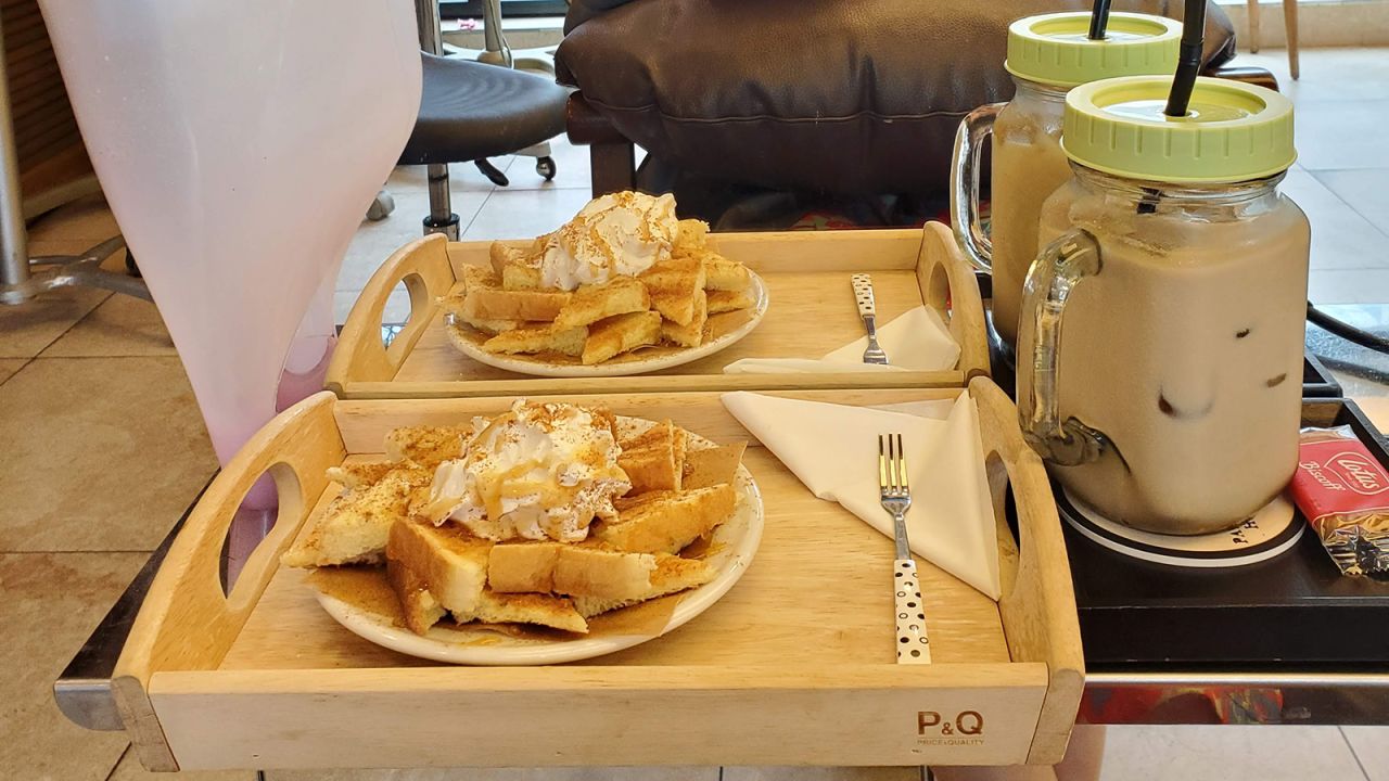 In South Korea, salons offer waffles and drinks to their waiting customers.