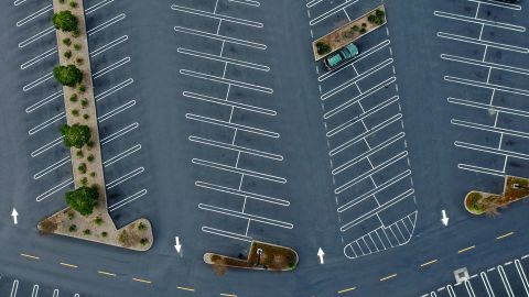 The parking lot is nearly empty at The Village shopping mall in Corte Madera, California, on March 17.