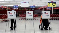 Voters fill out ballots during the primary election in Ottawa, Illinois, U.S., March 17, 2020. The polling station was relocated from a nearby nursing home to a former supermarket due to concerns over the outbreak of coronavirus (COVID-19). REUTERS/Daniel Acker     TPX IMAGES OF THE DAY