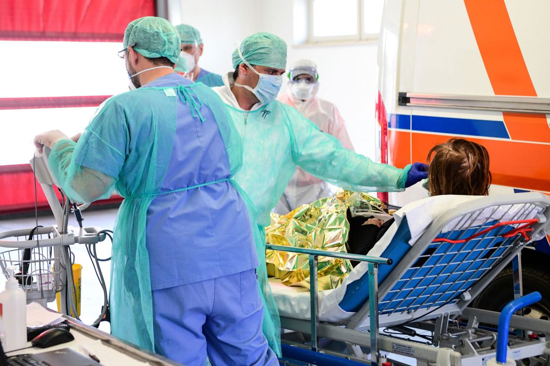 A medical worker and patient at the new coronavirus intensive care unit of the Brescia Poliambulanza hospital in Italy's Lombardy region.