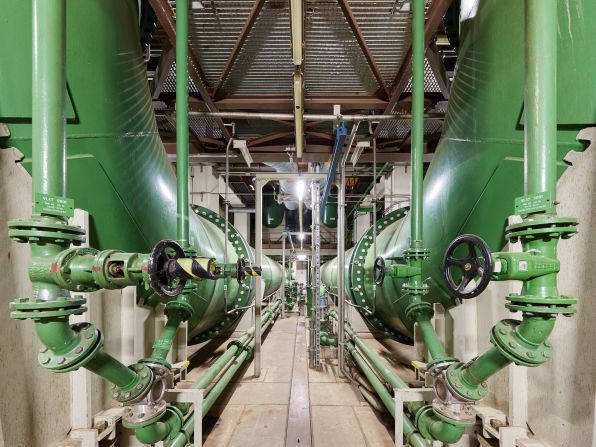 Ludewig often seeks out symmetrical forms, like these cooling pipes in the basement of Grafenrheinfeld Nuclear Power Plant.