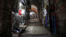 A deserted alley is seen in in Jerusalem's Old City, Sunday, March 15, 2020. Israel imposed sweeping travel and quarantine measures more than a week ago but has seen its number of confirmed coronavirus cases double in recent days, to around 200. On Saturday, the government said restaurants, malls, cinemas, gyms and daycare centers would close. (AP Photo/Mahmoud Illean)