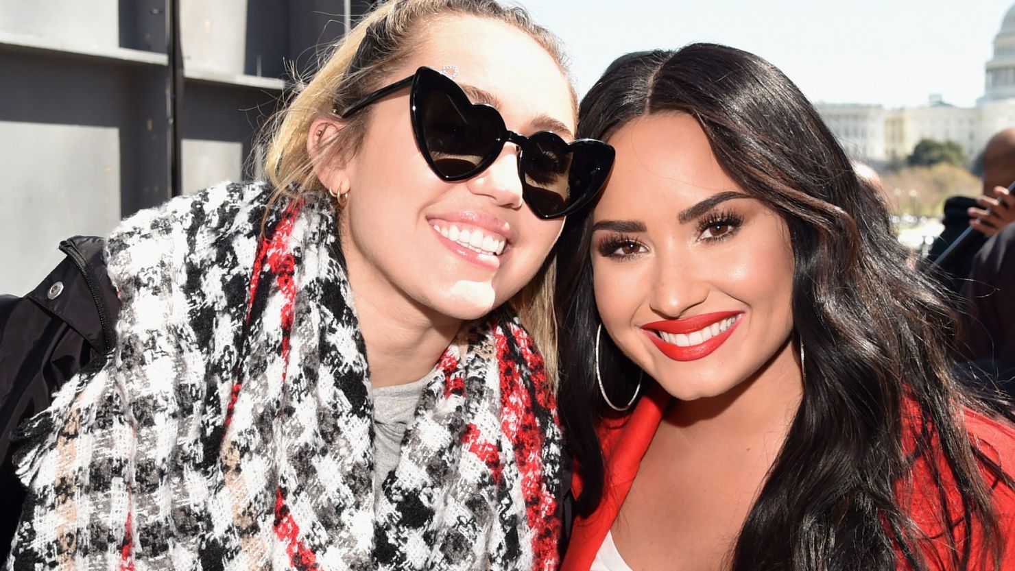 Miley Cyrus and Demi Lovato attend the March For Our Lives in Washington in 2018.