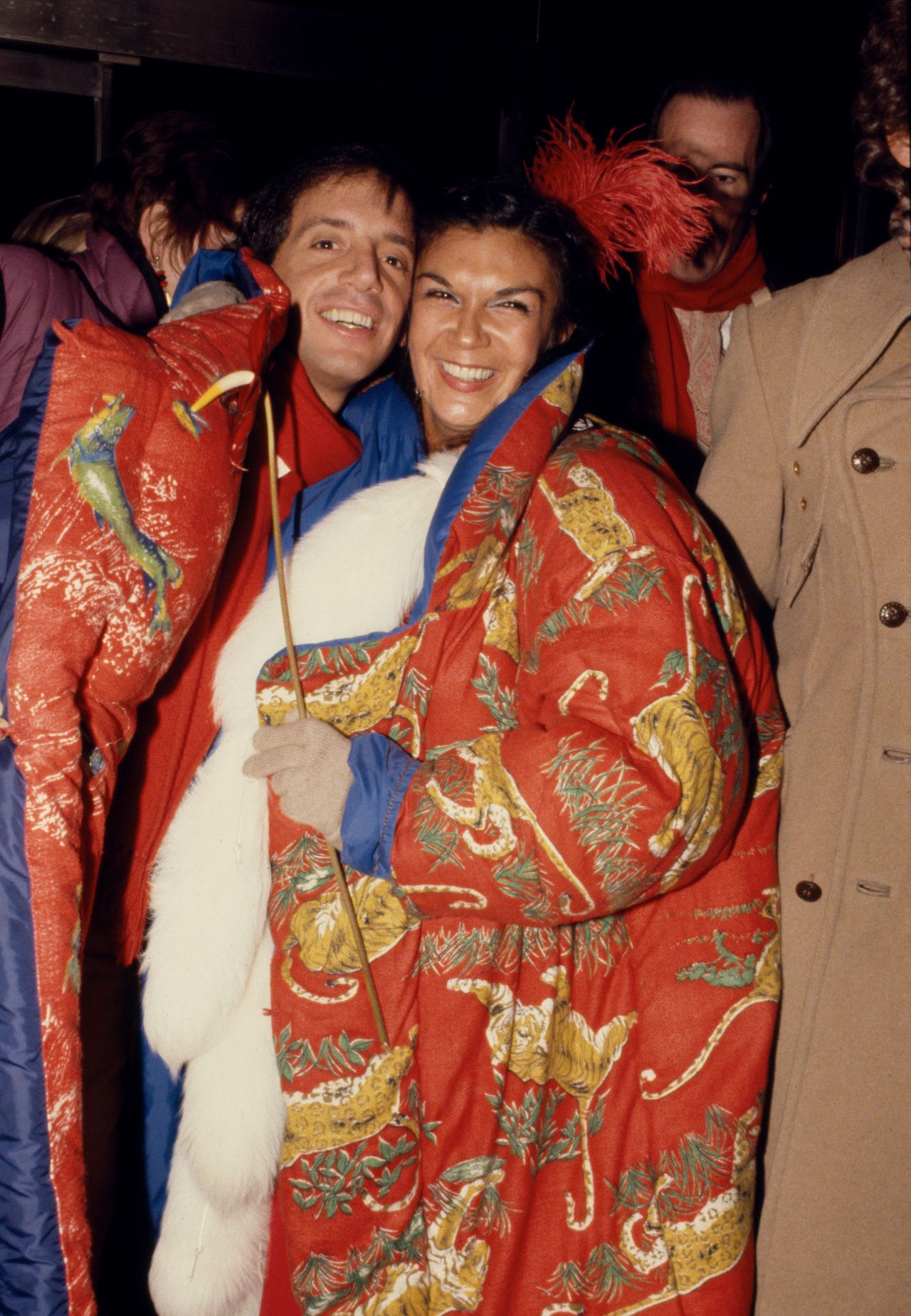 Steve Rubell and Carmen d'Alessio in Norma Kamali coats (1977)