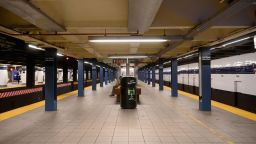 A near empty subway station in downtown Brooklyn  on March 17, 2020 in New York. - The coronavirus outbreak has transformed the US virtually overnight from a place of boundless consumerism to one suddenly constrained by nesting and social distancing.The crisis tests all retailers, leading to temporary store closures at companies like Apple and Nike, manic buying of food staples at supermarkets and big-box stores like Walmart even as many stores remain open for business -- albeit in a weirdly anemic consumer environment. (Photo by Angela Weiss/AFP/Getty Images)