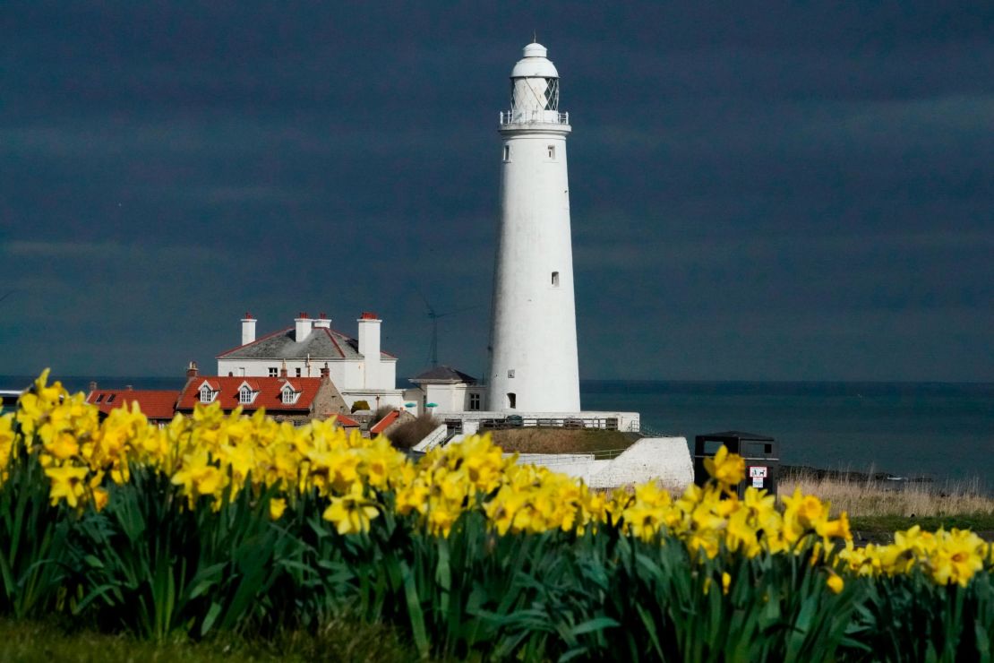 St Mary's Lighthouse greets the 2019 spring equinox at Whitley Bay on the northeast coast of England.