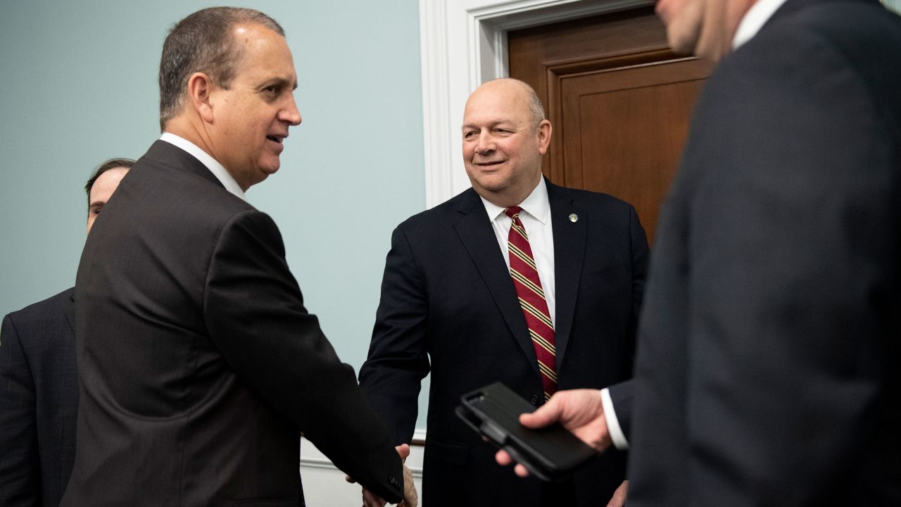 UNITED STATES - MARCH 11: FAA Administrator Steve Dickson, center, shakes hands with Ranking member Mario Diaz-Balart, R-Fla., before the start of a House Appropriations Subcommittee on Transportation, Housing and Urban Development, and Related Agencies hearing on "Federal Aviation Administration (FAA) Budget Request for FY2021" in Washington on Wednesday, March 11, 2020. (Photo by Caroline Brehman/CQ Roll Call via AP Images)