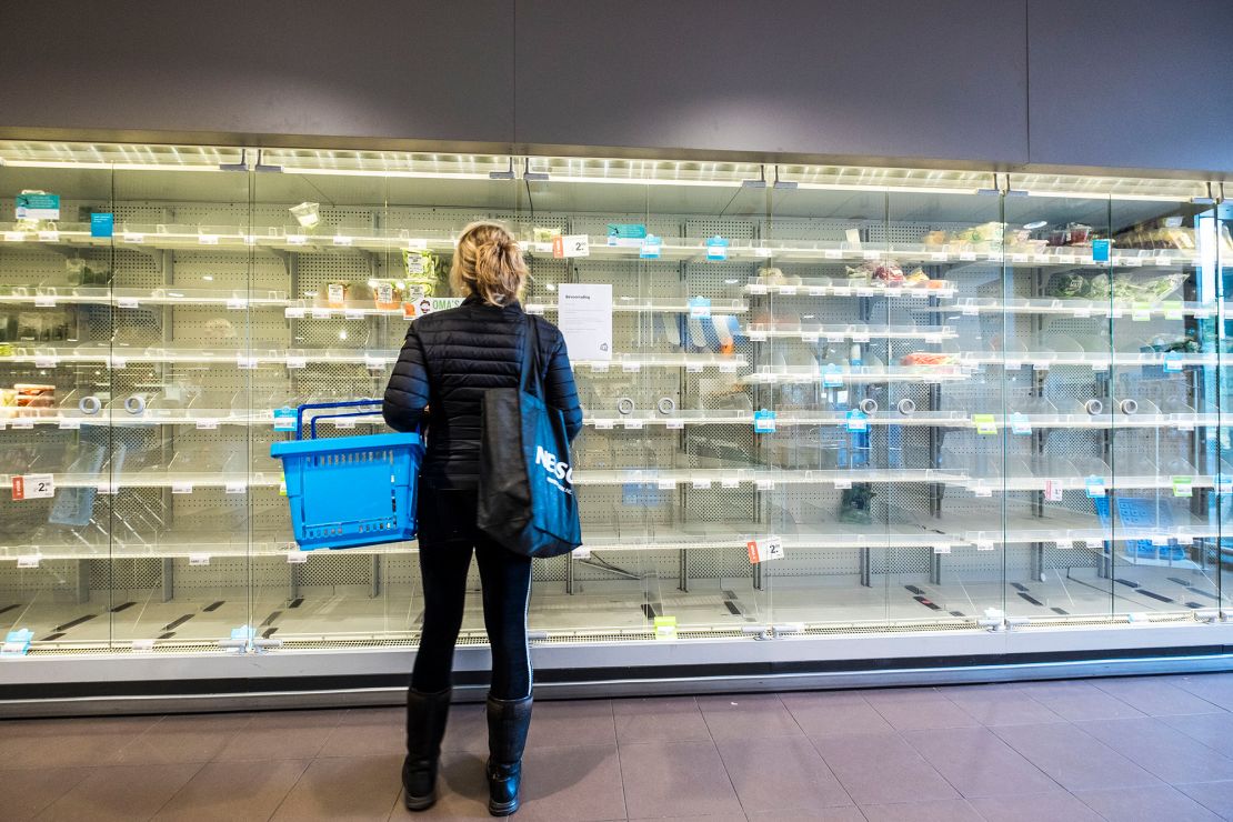 Shoppers are confronted with empty shelves at a supermarket on March 14 in Wassenaar, The Netherlands.