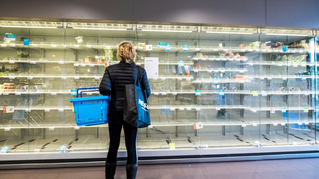 Shoppers are confronted with empty shelves at a supermarket on March 14 in Wassenaar, The Netherlands.