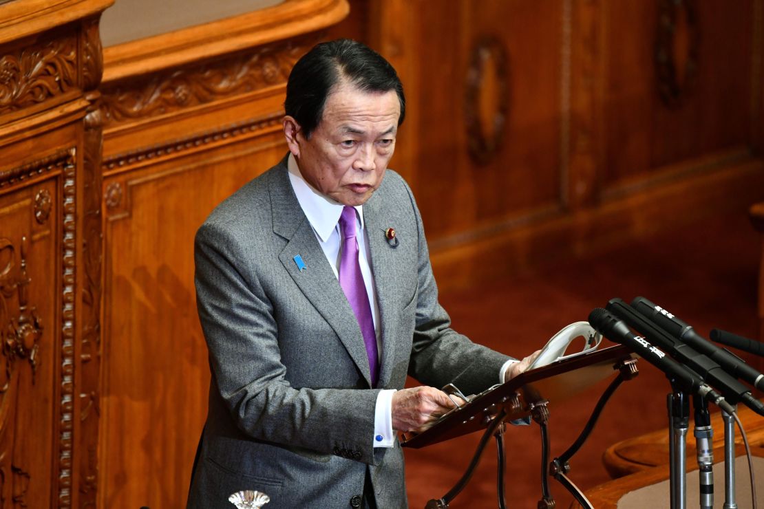 Taro Aso addresses parliament earlier this month. 