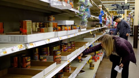 Shoppers are stocking up on canned foods and other shelf-stable products. (Jeremy Hogan/Echoes Wire/Barcroft Media/Getty Images)