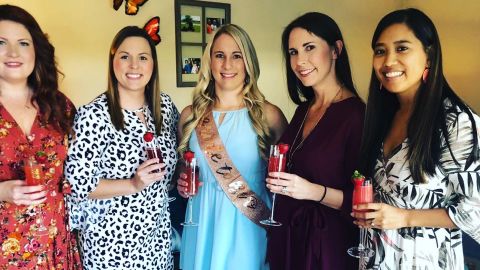 Kelly Williams (center) with her bridesmaids at her bridal shower. 