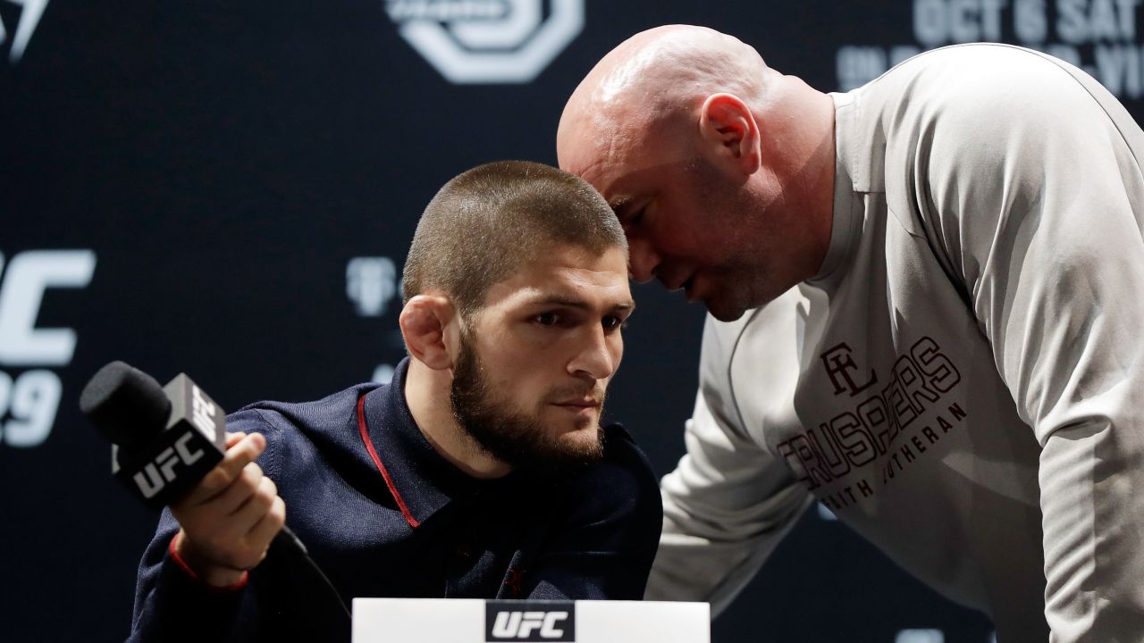 White speaks with UFC lightweight champion Khabib Nurmagomedov.