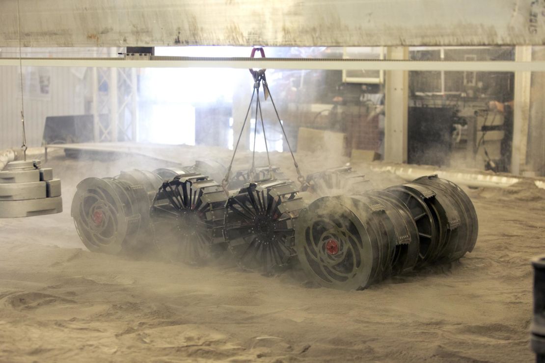 The Regolith Advanced Surface Systems Operations Robot goes through a test in the regolith bin.