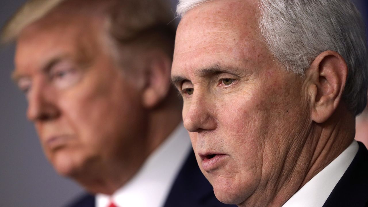 Vice President Mike Pence speaks as President Donald Trump listens during a news briefing on the latest development of the coronavirus outbreak in the U.S. at the James Brady Press Briefing Room at the White House March 18, 2020 in Washington, DC.