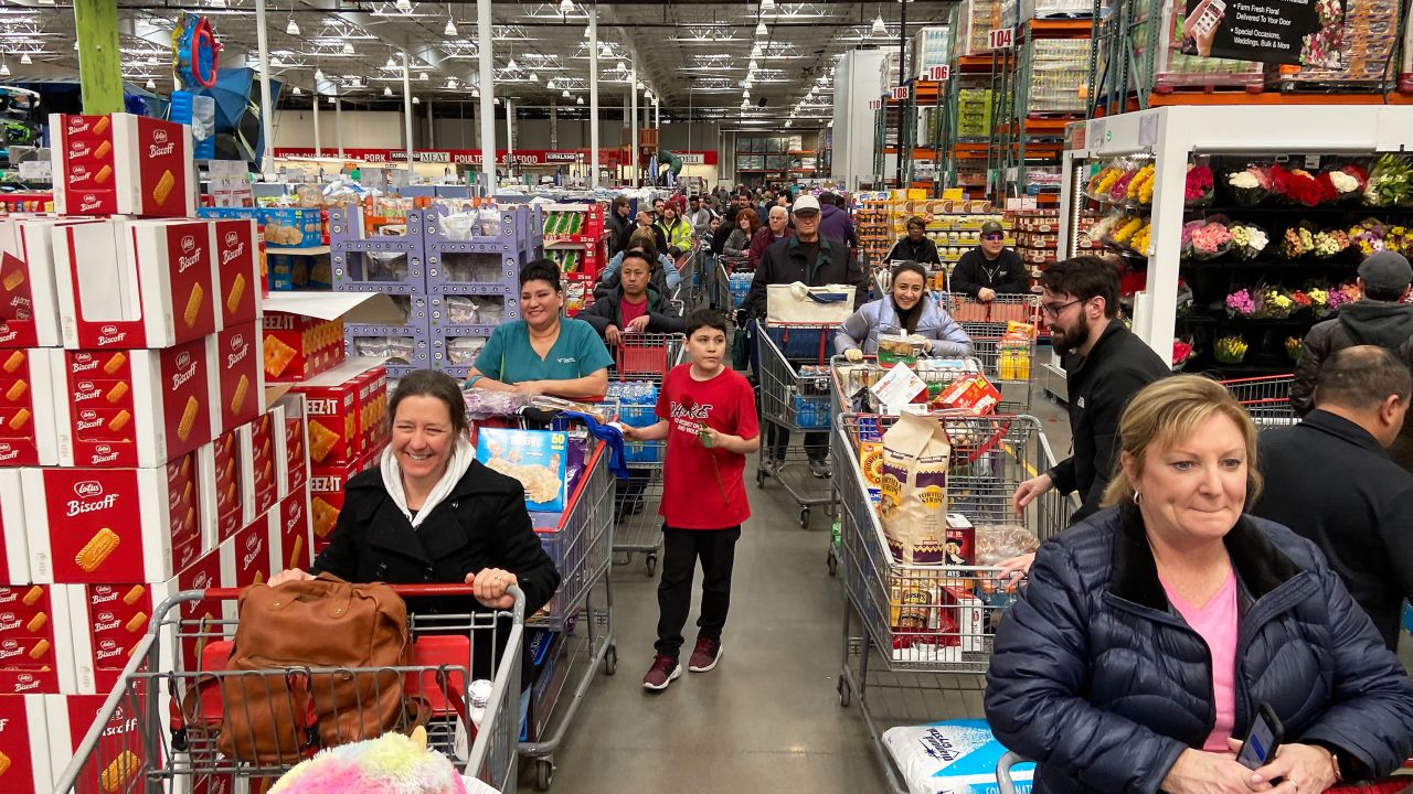 Shoppers flooded a Costco in Minnesota on March 13 as they stocked up on household items in response to the coronavirus.