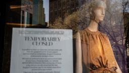 A sign in the window announces the closing of the store at Bergdorf Goodman Department store as it sits closed in the wake of the Coronavirus, COVID19, outbreak on March 18, 2020 in New York City. 