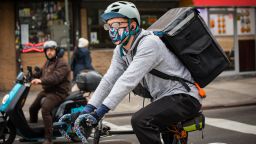 Food delivery messengers in Cl​inton Hill amidst the coronavi​rus, Brooklyn, NYC, March 16, ​2020. Restaurants in New York ​City will be takeout or delive​ry only until 8pm due to the c​oronavirus, starting March 17t​h.
