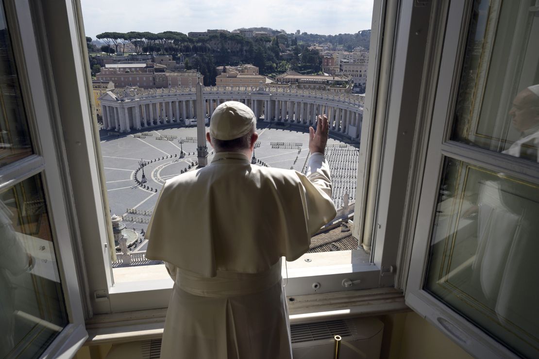 The Pope delivers his blessing from inside the Apostolic Library at the Vatican on March 15.