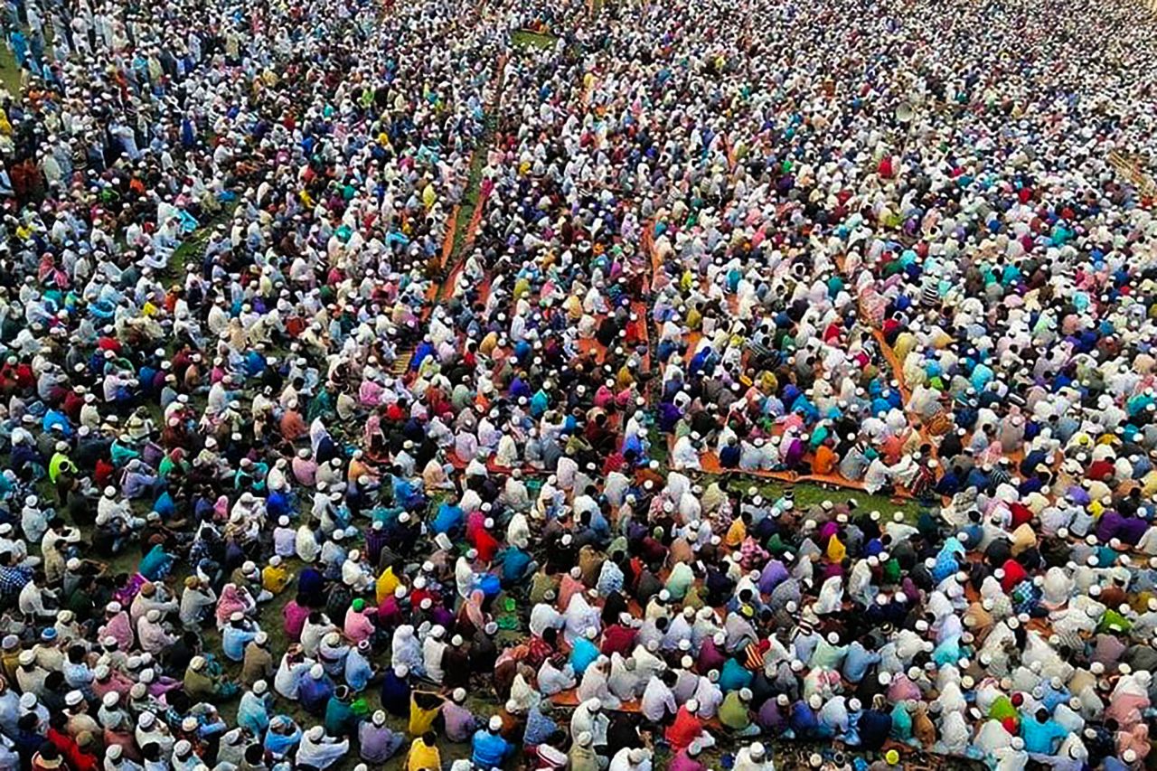 Thousands of Muslims attend a prayer session near Raipur, Bangladesh, to ask for protection from the coronavirus on Wednesday, March 18.