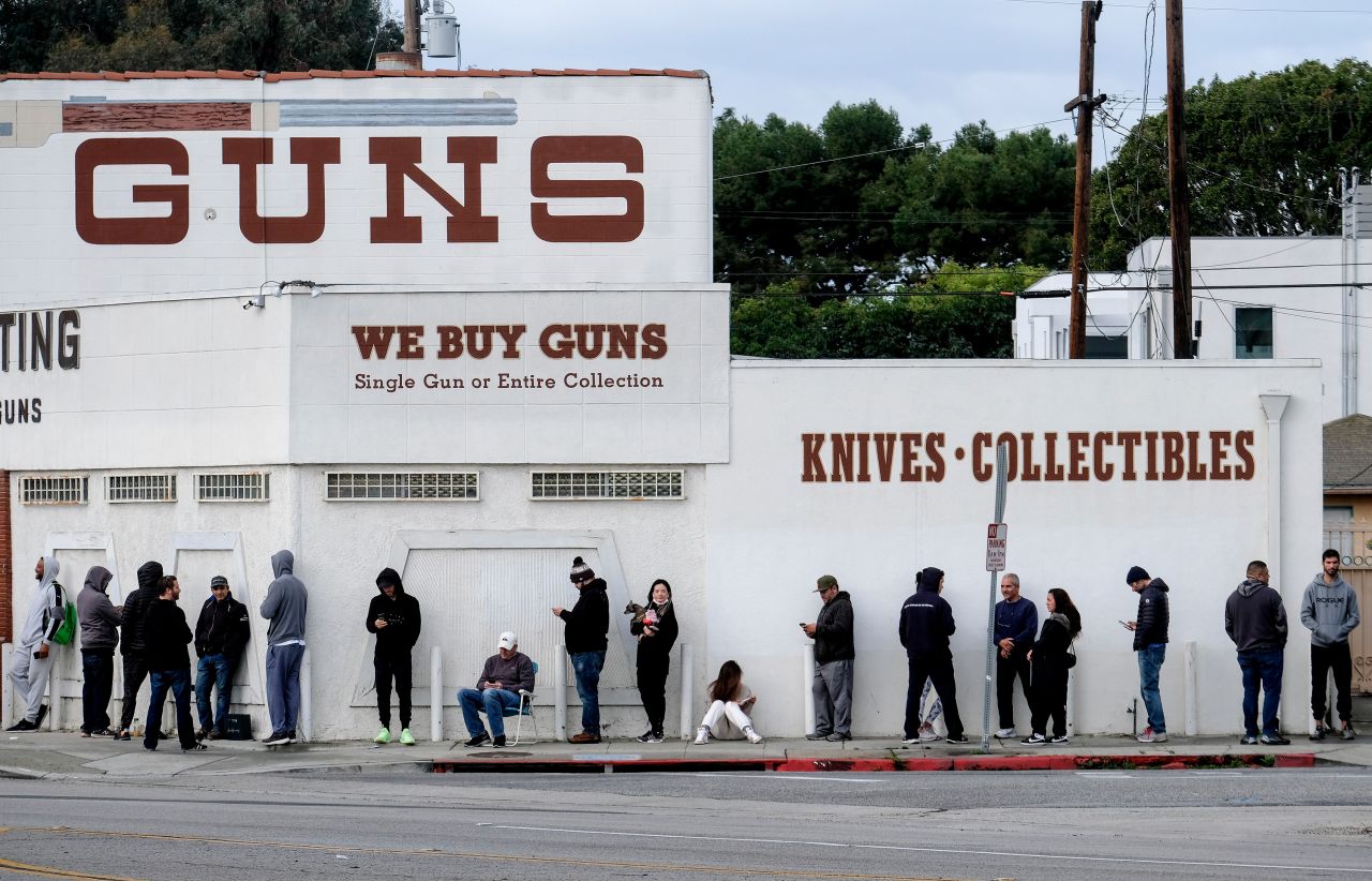 People wait in line to enter a gun store in Culver City, California, on Sunday, March 15. Gun sellers across the United States are reporting <a href="https://www.cnn.com/2020/03/19/business/coronavirus-gun-sales/index.html" target="_blank">major spikes in firearm and bullet purchases</a> as the coronavirus spreads across the country.
