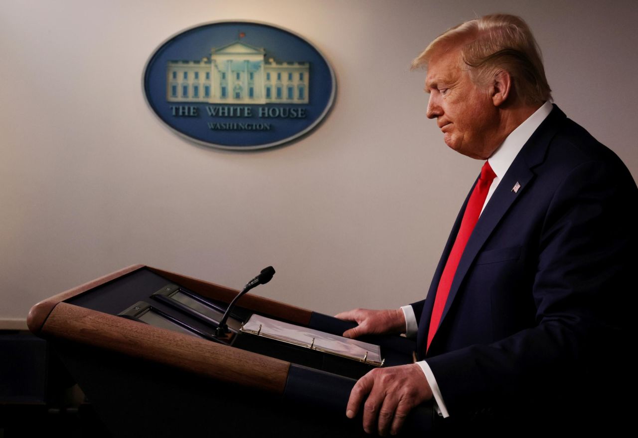 President Donald Trump pauses during a coronavirus briefing on Wednesday, March 18.