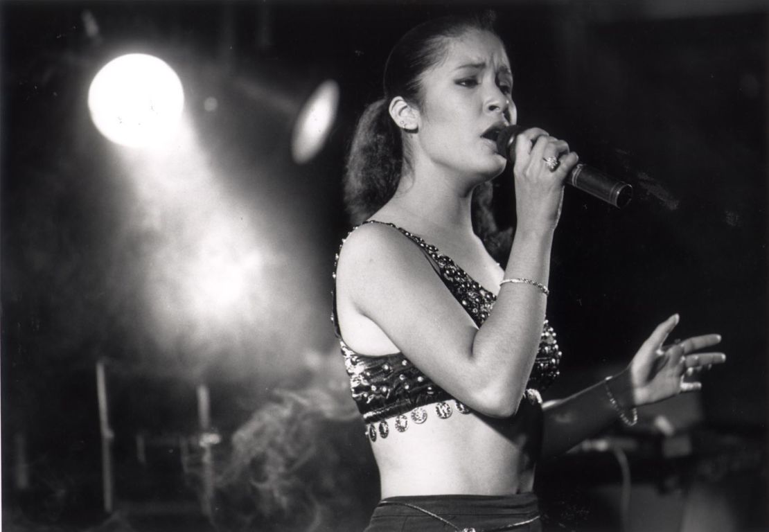 Selena Quintanilla performs for the crowd during a dance following the Feria de las Flores queen's contest at Memorial Coliseum Aug. 12, 1989, in Corpus Christi, Texas. 