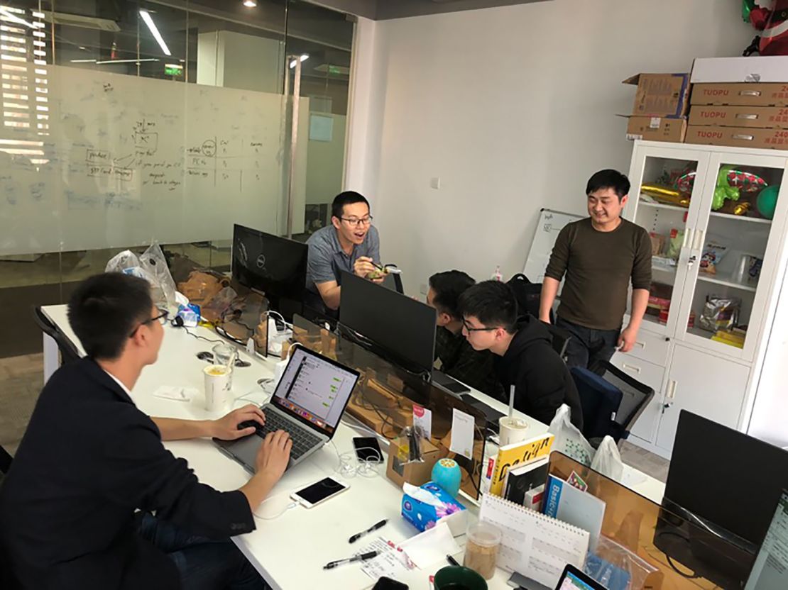 TravelFlan employees in Shanghai. The Hong Kong-based startup struggled to make ends meet last year before changing its strategy and winning new investment.