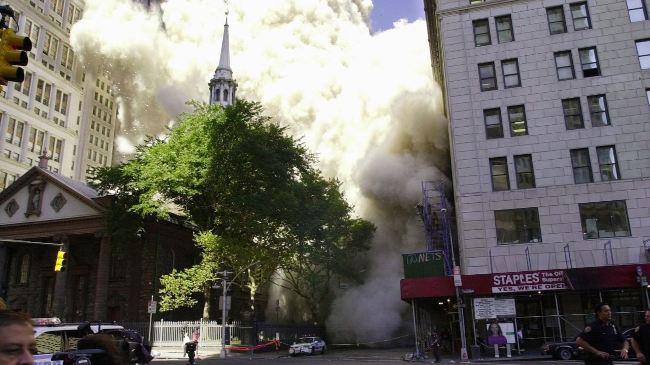 Dust and smoke enveloped St. Paul's Chapel as one of World Trade Center towers collapsed on September 11, 2001.