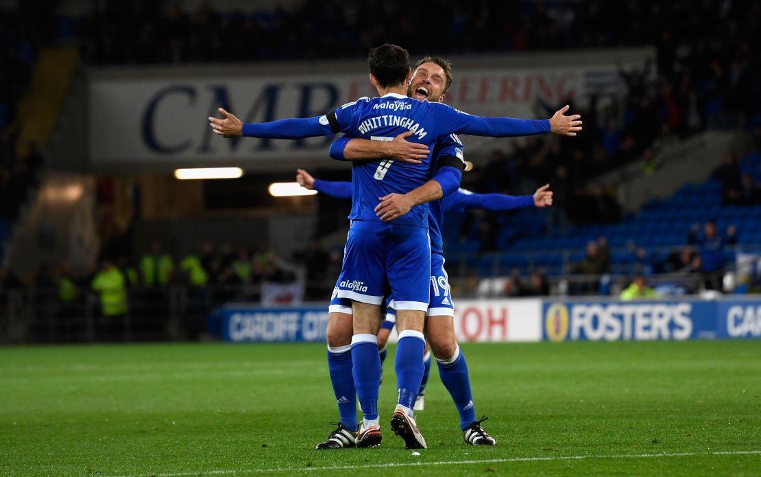 Whittingham is congratulated by Rickie Lambert after scoring a free kick against Sheffield Wednesday.