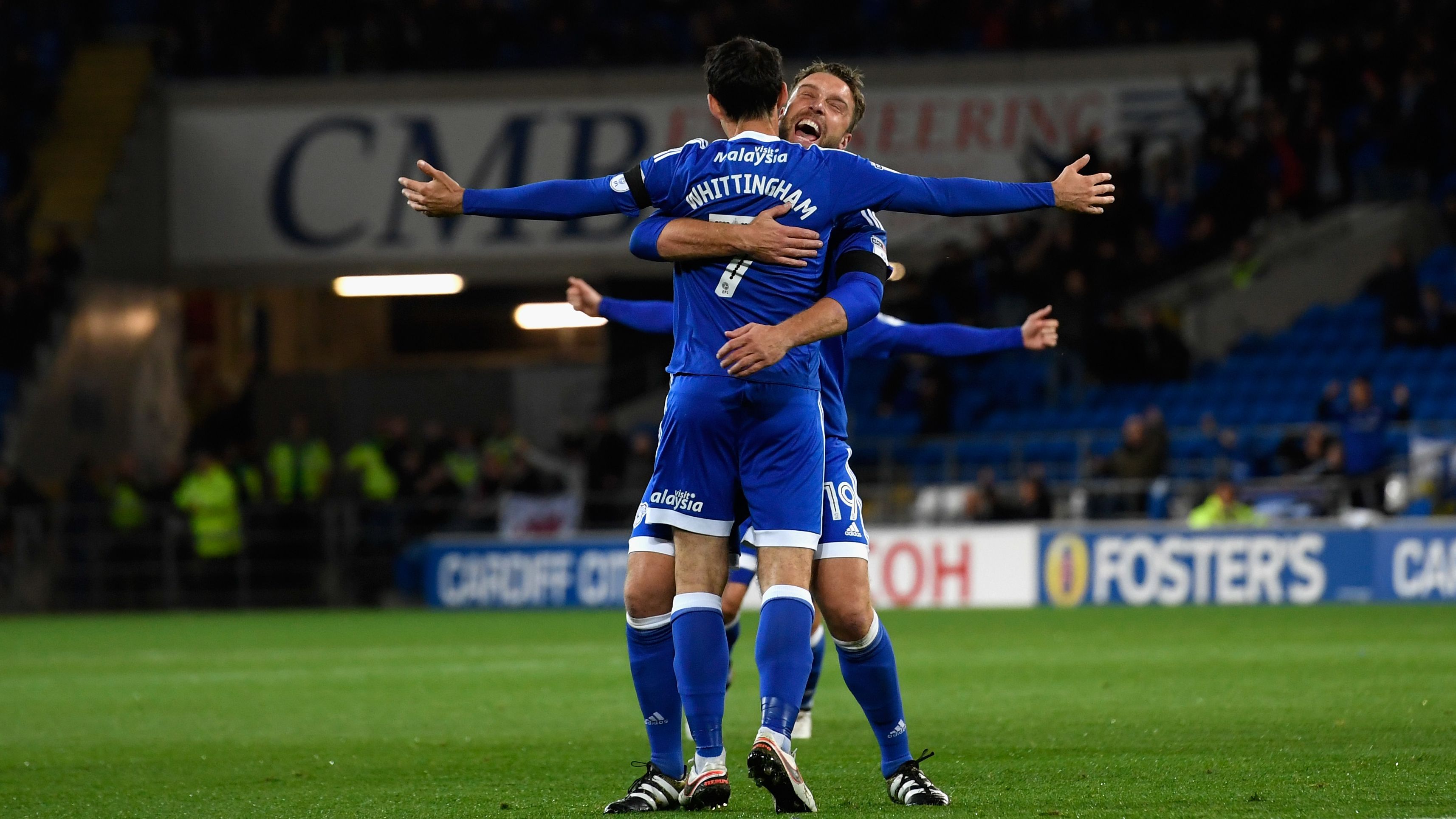 Whittingham is congratulated by Rickie Lambert after scoring a free kick against Sheffield Wednesday.