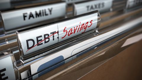 underscored folders marked debt and savings