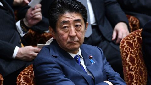 Japanese Prime Minister Shinzo Abe attends a parliamentary session in Tokyo on March 2, 2020.