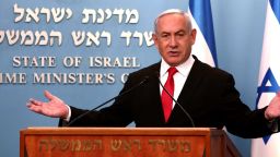Israeli Prime Minister Benjamin Netanyahu delivers an speech at his Jerusalem office on March 14, 2020, regarding the new measures that will be taken to fight the Corona virus in Israel. - Netanyahu said Israel would shut down eateries, shopping centres and gyms in a bid to halt the spread of coronavirus. Netanyahu also said he would ask the government's approval in the upcoming cabinet meeting set to be held via video conference to allow "technologies used in the war against terror" to be used to track the movements of Israelis with coronavirus. (Photo by GALI TIBBON / POOL / AFP) (Photo by GALI TIBBON/POOL/AFP via Getty Images)