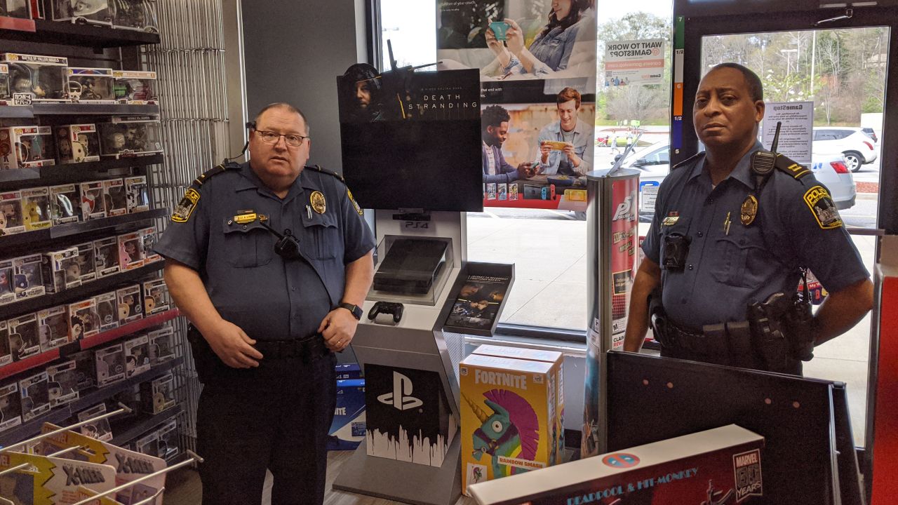Police visit a GameStop in Athens, Georgia to order the store to shut down and comply with shelter-in-place rules.