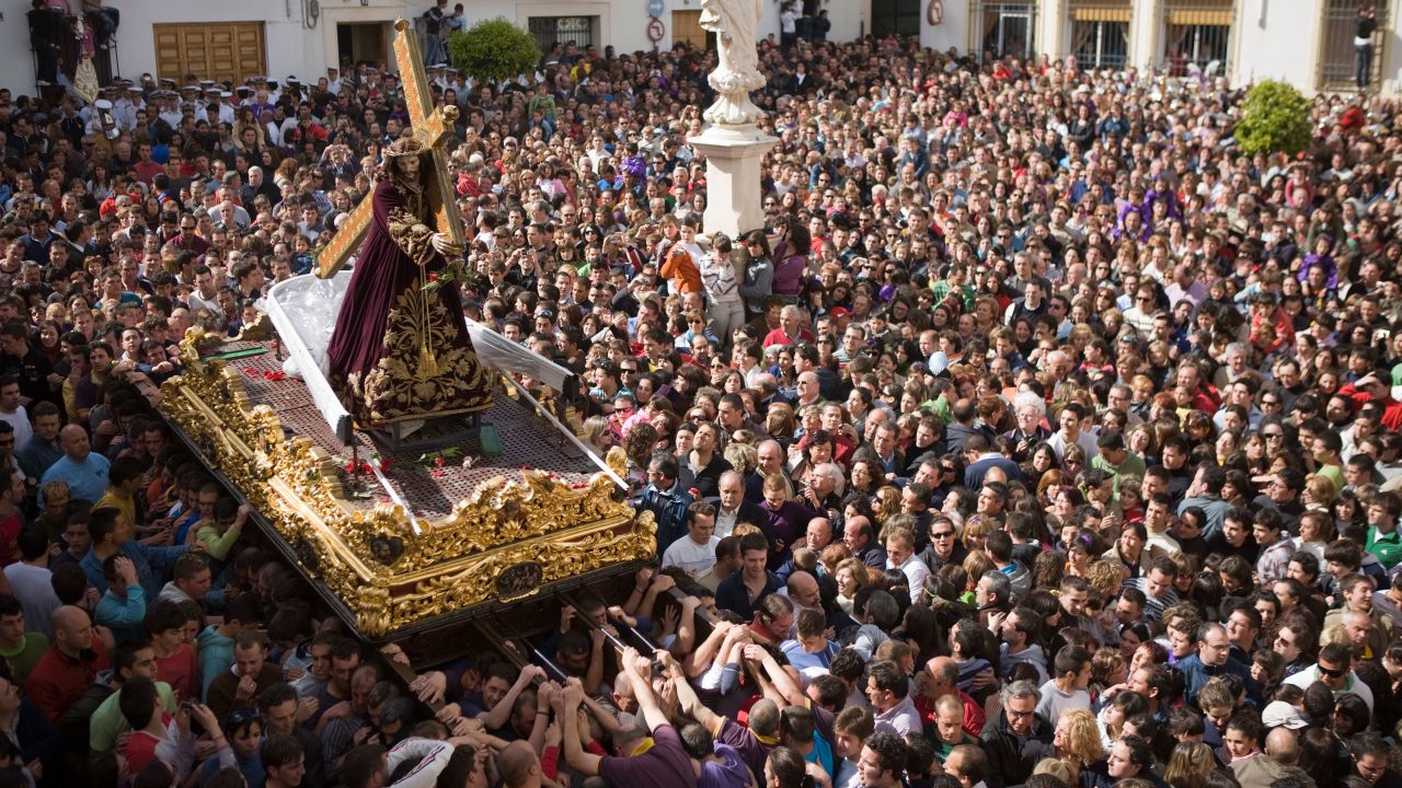 Crowds watch the procession during Holy Week in Priego de Cordoba in 2009.