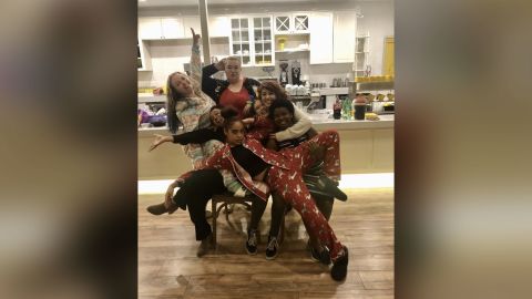 The La La Land Kind Cafe team celebrating Christmas at the cafe together.