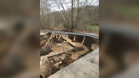 High waters washed away a bridge over Sanes Creek in Franklin County, Indiana, on Friday.