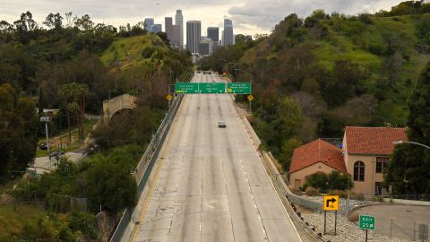 Light traffic moves along a freeway in downtown Los Angeles on March 20.