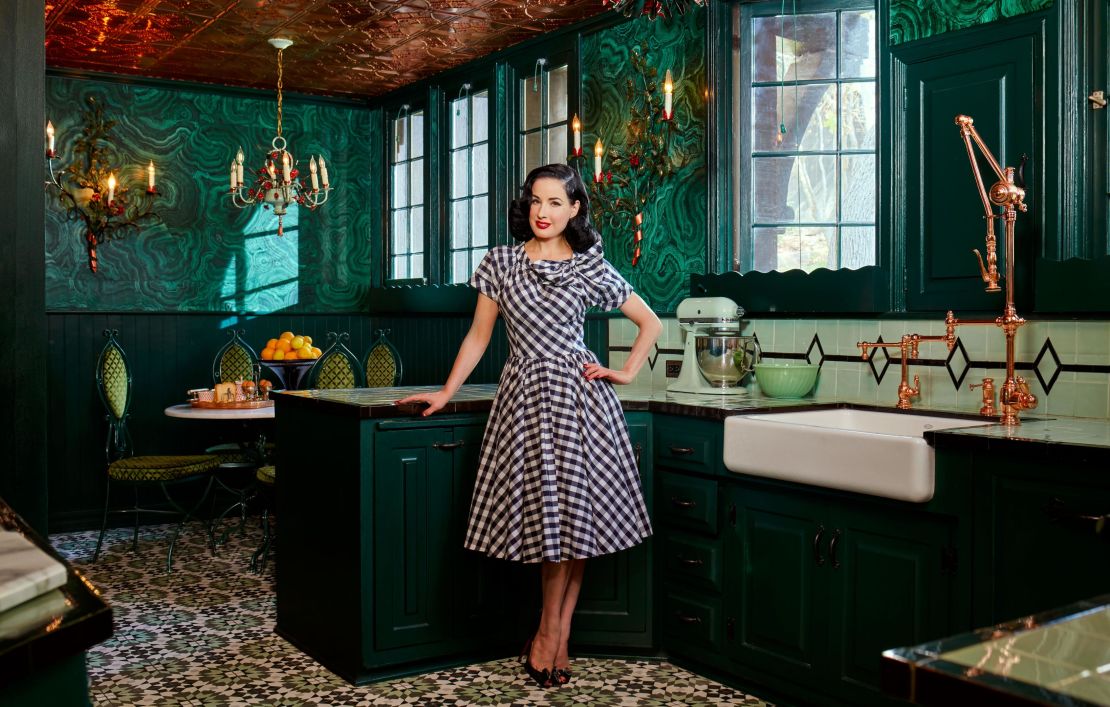 Dita Von Teese poses in her luxurious LA kitchen