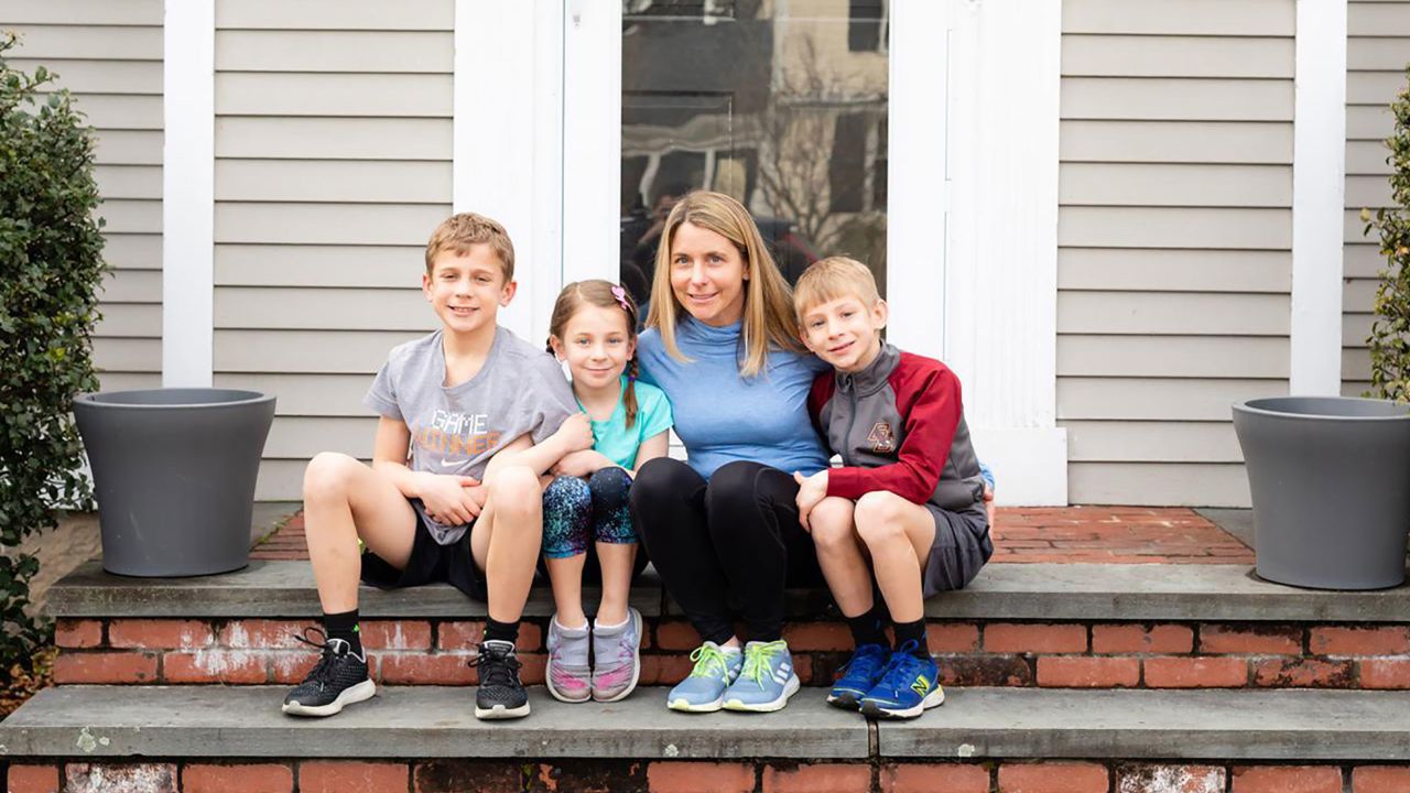 A family poses for The Front Steps Project. The father, who is not pictured, is a physician currently working extremely long hours amidst the coronavirus pandemic.