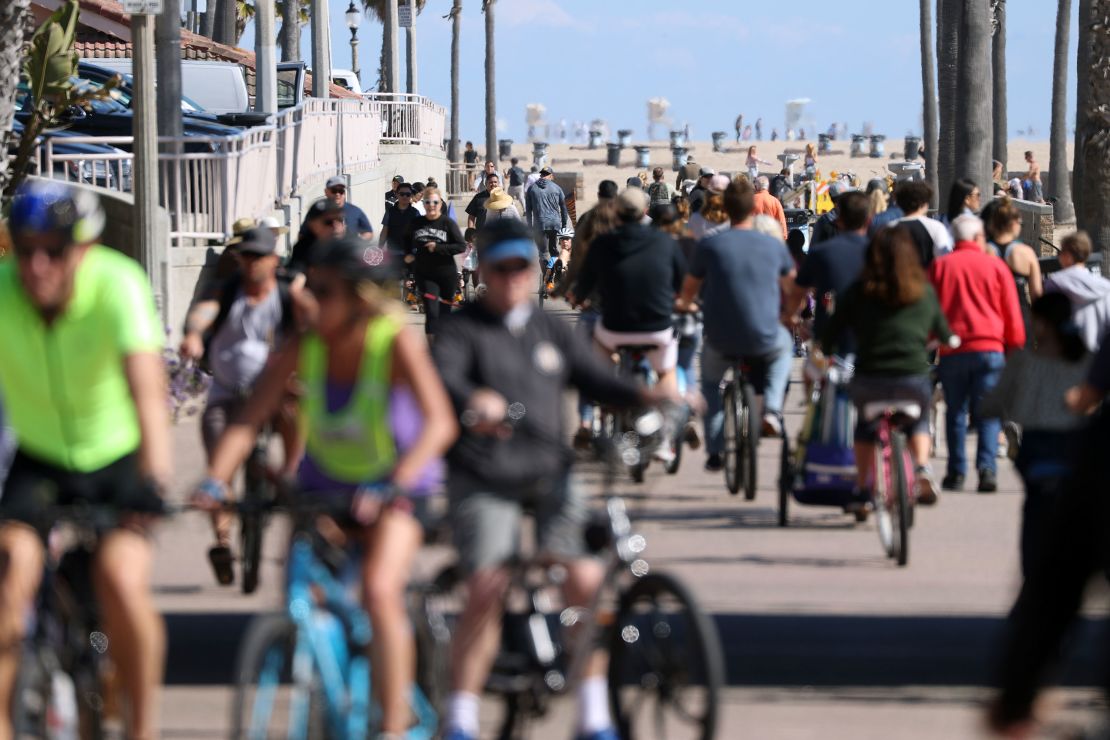 A bike path in Huntington Beach, California was packed Saturday despite a shelter in place order from the Governor.