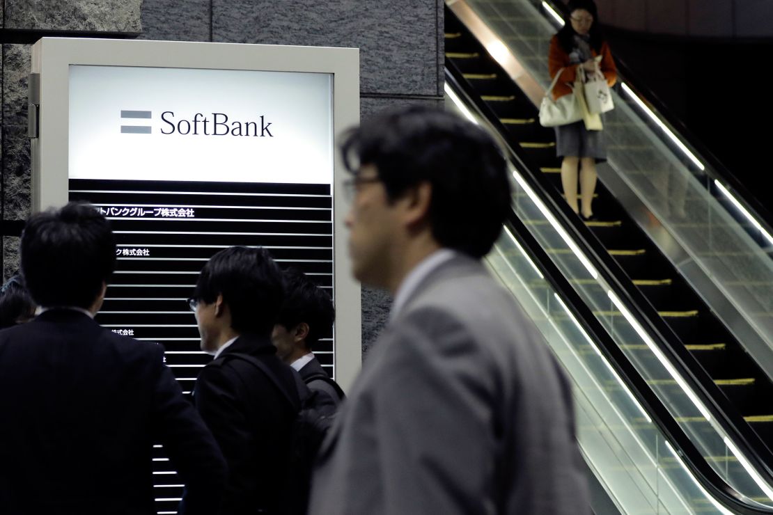 Pedestrians walking past SoftBank Group headquarters in Tokyo in 2018.