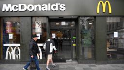 PLYMOUTH, UNITED KINGDOM - MARCH 19:  Two members of the public make their way into a  McDonalds restaurant that will only be offering takeaways due to the Coronavirus on March 19, 2020 in Plymouth, United Kingdom. Coronavirus (Covid-19) has spread to over 176 countries, claiming nearly 9,000 lives and infecting over 219,000. There are currently 2,626 diagnosed cases in the UK and 104 deaths. (Photo by Dan Mullan/Getty Images)