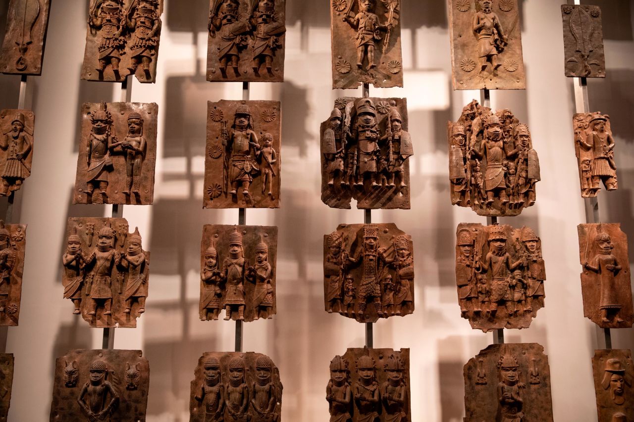 Plaques that form part of the Benin Bronzes are displayed at The British Museum (2018)