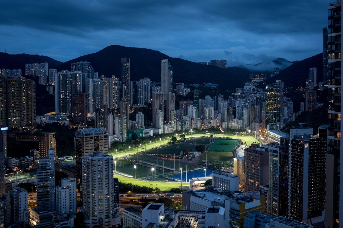 Horses are seen on the racetrack at the Happy Valley racecourse in Hong Kong.