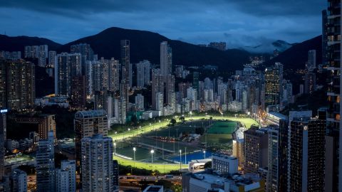 Horses are seen on the racetrack at the Happy Valley racecourse in Hong Kong.