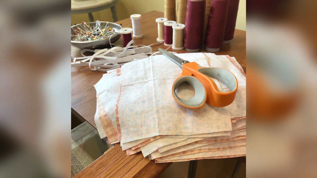 The masks are crafted with pieces of fabric and elastic.